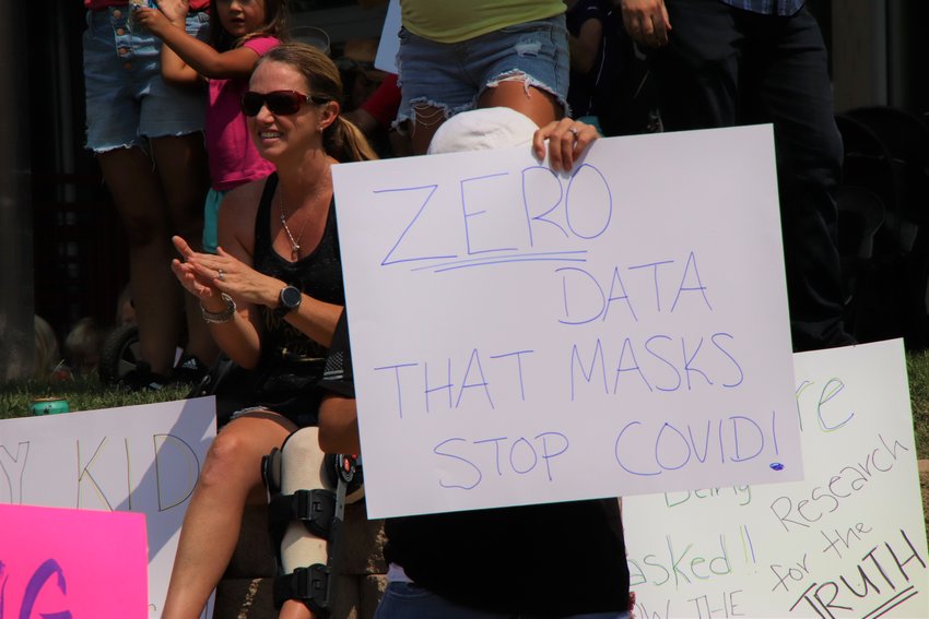 A sign read, "Zero data that masks stop COVID!" during an Aug. 30 protest against mask requirements. The crowd gathered at the Arapahoe County administration building in Littleton.